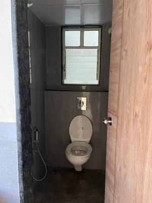 Bathroom in 2 BHK Apartment at Abhinav Pebbles Urbania, Bavdhan – for Rent