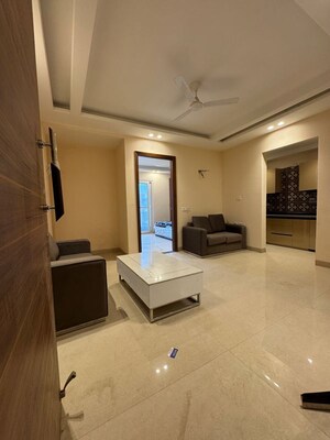 Living Room in 2 BHK Apartment at Palm Residency Chhatarpur, Rajpur Khurd Extension – for Rent