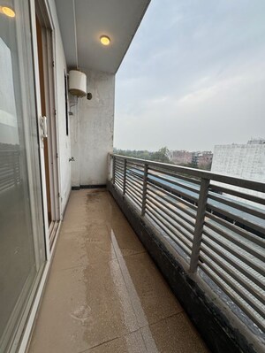 Balcony in 2 BHK Apartment at Palm Residency Chhatarpur, Rajpur Khurd Extension – for Rent