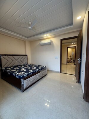 Bedroom in 2 BHK Apartment at Palm Residency Chhatarpur, Rajpur Khurd Extension – for Rent