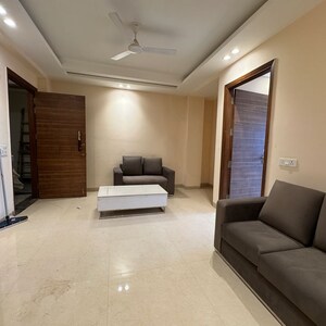 Living Room in 2 BHK Apartment at Palm Residency Chhatarpur, Rajpur Khurd Extension – for Rent