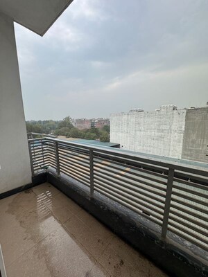 Balcony in 2 BHK Apartment at Palm Residency Chhatarpur, Rajpur Khurd Extension – for Rent
