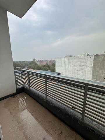 Balcony in 2 BHK Apartment at Palm Residency Chhatarpur, Rajpur Khurd Extension – for Rent