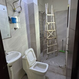 Bathroom in 1 BHK Apartment at Palm Residency Chhatarpur, Rajpur Khurd Extension – for Rent