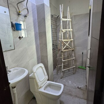 Bathroom in 1 BHK Apartment at Palm Residency Chhatarpur, Rajpur Khurd Extension – for Rent