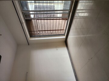 Staircase in 1 BHK Apartment at Kalpataru Hills Phase II, Manpada – for Rent