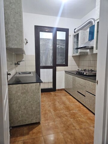 Kitchen in 3 BHK Apartment at Emaar The Palm Drive-Palm Studios, Sector 66 – for Rent