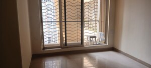 Room in 1 BHK Apartment at Agarwal Trinity Towers, Malad West – for Rent