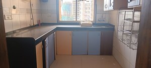 Kitchen in 1 BHK Apartment at Agarwal Trinity Towers, Malad West – for Rent