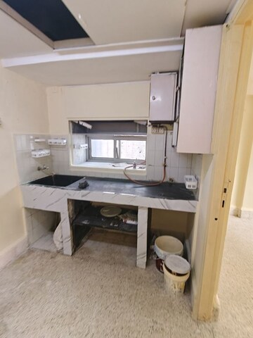 Kitchen in 1 BHK Apartment at New Tulip CHS, Kandivali East – for Rent
