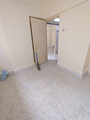 Room in 1 BHK Apartment at New Tulip CHS, Kandivali East – for Rent