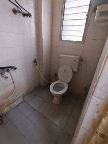 Bathroom in 1 BHK Apartment at New Tulip CHS, Kandivali East – for Rent