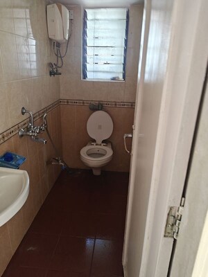 Bathroom in 1 BHK Apartment at Lokhandwala Infrastructure Spring Leaf, Kandivali East – for Rent