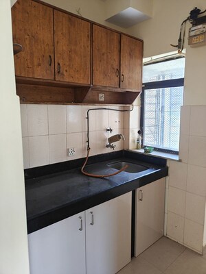 Kitchen in 1 BHK Apartment at Lokhandwala Infrastructure Spring Leaf, Kandivali East – for Rent