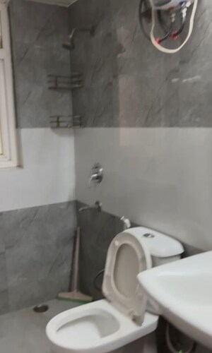 Bathroom in 3 BHK Apartment at Dhoot Time Residency, Sector 63 – for Rent