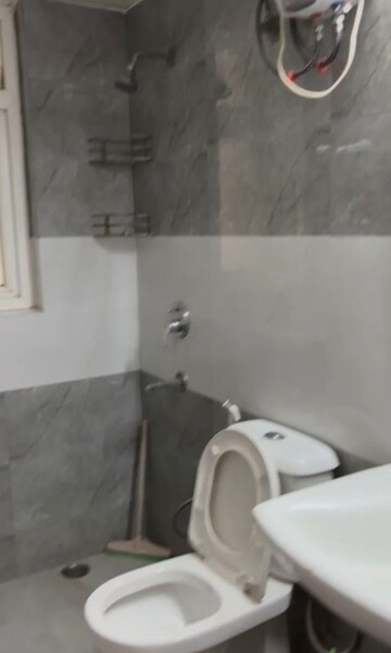 Bathroom in 3 BHK Apartment at Dhoot Time Residency, Sector 63 – for Rent