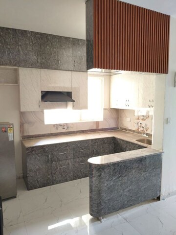 Kitchen in 2 BHK Apartment at Pivotal Riddhi Siddhi, Sector 99 – for Rent