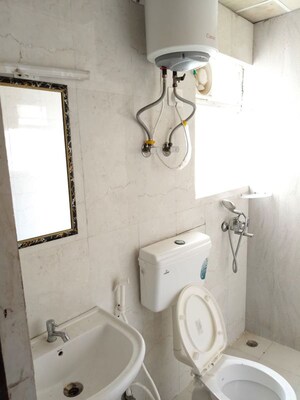 Bathroom in 2 BHK Apartment at Pivotal Riddhi Siddhi, Sector 99 – for Rent