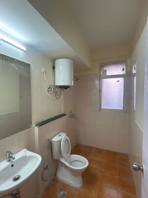 Bathroom in 3 BHK Apartment at Jaypee Greens Kensington Park Apartment Heights, Sector 133 – for Rent