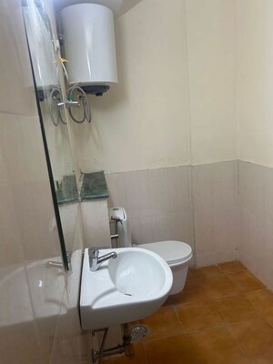 Bathroom in 3 BHK Apartment at Jaypee Greens Kensington Park Apartment Heights, Sector 133 – for Rent