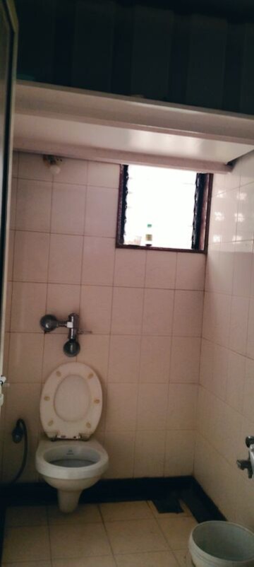 Bathroom in 2 BHK Apartment at Muktangan CHS Malad, Malad East – for Sale