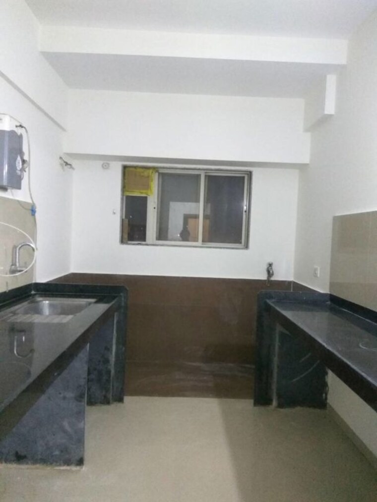 Kitchen, dange-casa-7 2 Bedroom 1200 Sq.Ft. Apartment In Thergaon Pune 9990486