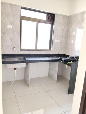 Kitchen in 1 BHK Apartment at Godrej Nest Kandivali, Kandivali East – for Rent