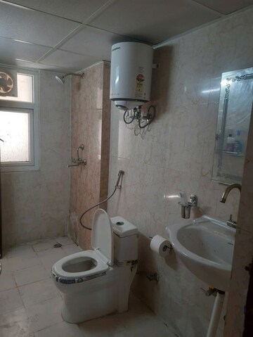 Bathroom in 3 BHK Apartment at Amrapali Heartbeat City, Sector 107 – for Rent