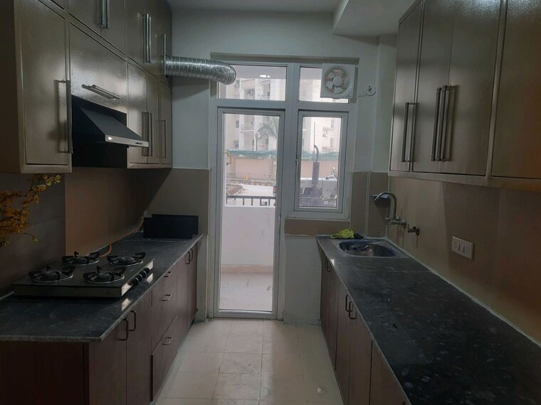 Kitchen, amrapali-heartbeat-city 3 Bedroom 1735 Sq.Ft. Apartment In Sector 107 Noida 9991413