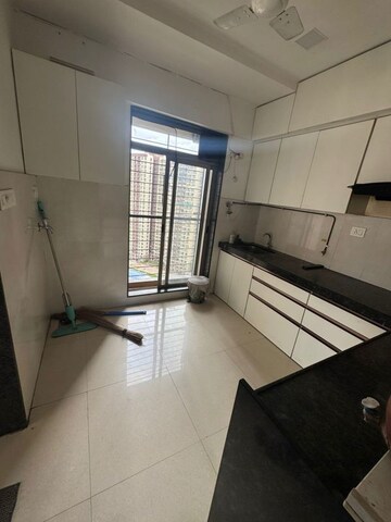 Kitchen in 1 BHK Apartment at Kalpataru Immensa, Kolshet Road – for Sale