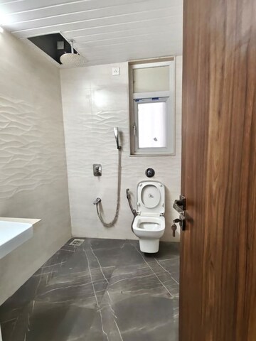 Bathroom in 3 BHK Apartment at Dynamix Shagun Mall Tower, Malad East – for Rent