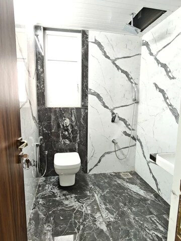Bathroom in 3 BHK Apartment at Dynamix Shagun Mall Tower, Malad East – for Rent