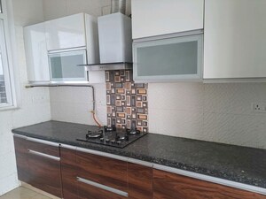 Kitchen in 2.5 BHK Apartment at Central Park Resorts, Sector 48 – for Sale
