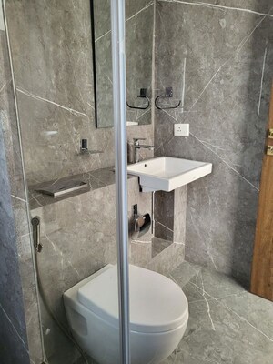 Bathroom in 4 BHK Apartment at Laxman Nagar – for Rent