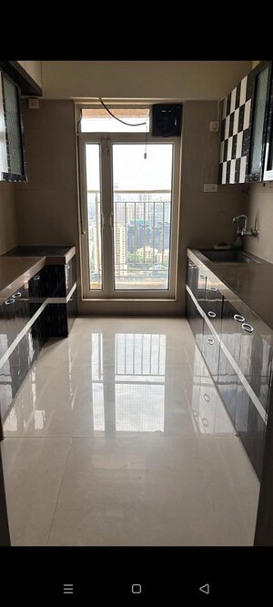 Kitchen in 2 BHK Apartment at Dosti Group Imperia, Manpada – for Sale