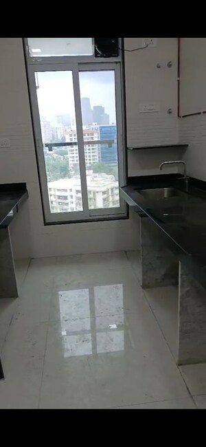 Kitchen in 2 BHK Apartment at Triumph Swastik, Malad West – for Sale