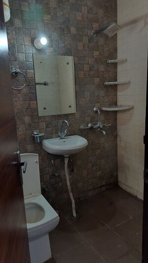 Bathroom in 1 BHK Builder Floor at Ansal Sushant Apartments, Sushant Lok I – for Rent