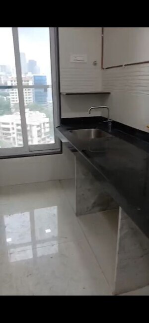 Kitchen in 2 BHK Apartment at Triumph Swastik, Malad West – for Sale