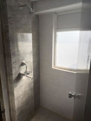 Bathroom in 2.5 BHK Apartment at Amrapali Dream Valley – for Rent