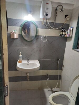Bathroom in 2 BHK Apartment at Om Sai Plaza, Ghodbunder Road – for Rent