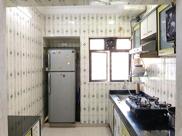 Kitchen in 2 BHK Apartment at Cosmos Park, Ghodbunder Road – for Rent