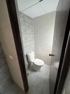 Bathroom in 1 BHK Apartment at Amrapali Dream Valley – for Sale