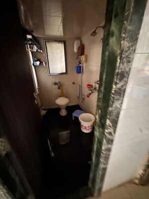Bathroom in 2 BHK Apartment at Prarthana CHS, Goregaon West – for Rent