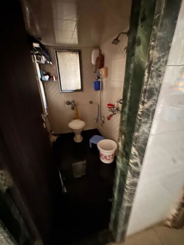 Bathroom in 2 BHK Apartment at Prarthana CHS, Goregaon West – for Rent