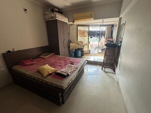 Bedroom in 2 BHK Apartment at Prarthana CHS, Goregaon West – for Rent
