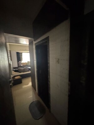 Master Bedroom in 2 BHK Apartment at Prarthana CHS, Goregaon West – for Rent