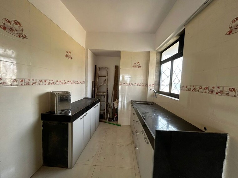 Kitchen, cosmos-park 2 Bedroom 700 Sq.Ft. Apartment In Ghodbunder Road Thane 9993241