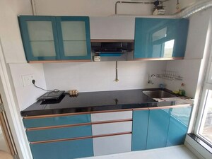 Kitchen in 1 BHK Apartment at Metropolis Bayside, Kasarvadavali – for Rent