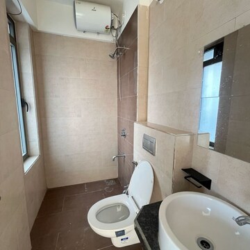 Bathroom in 3 BHK Apartment at Rustomjee Summit, Datta Pada – for Rent