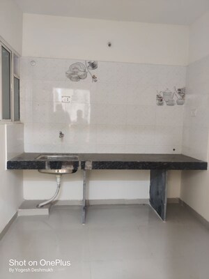 Kitchen in 1 BHK Apartment at Jayshree Residency, Shivane – for Sale